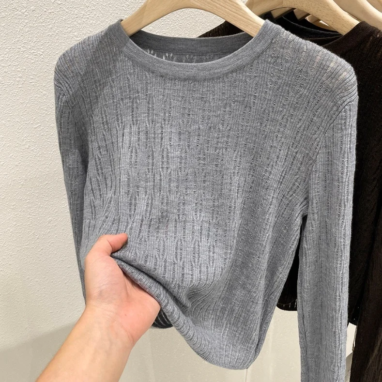 

2021 Early Autumn round Neck Hollow Thin Sweater