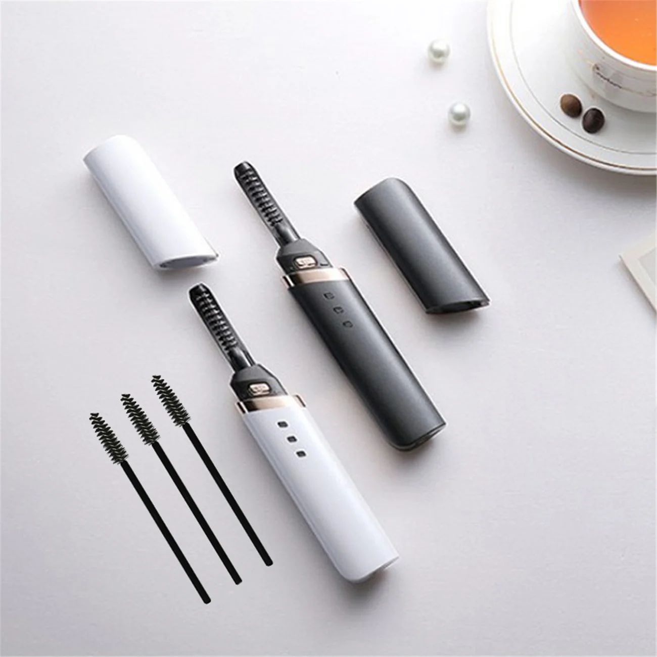 

Wholesale Mini Electric Makeup Sets Tools Plastic Heated Eyelash Curler