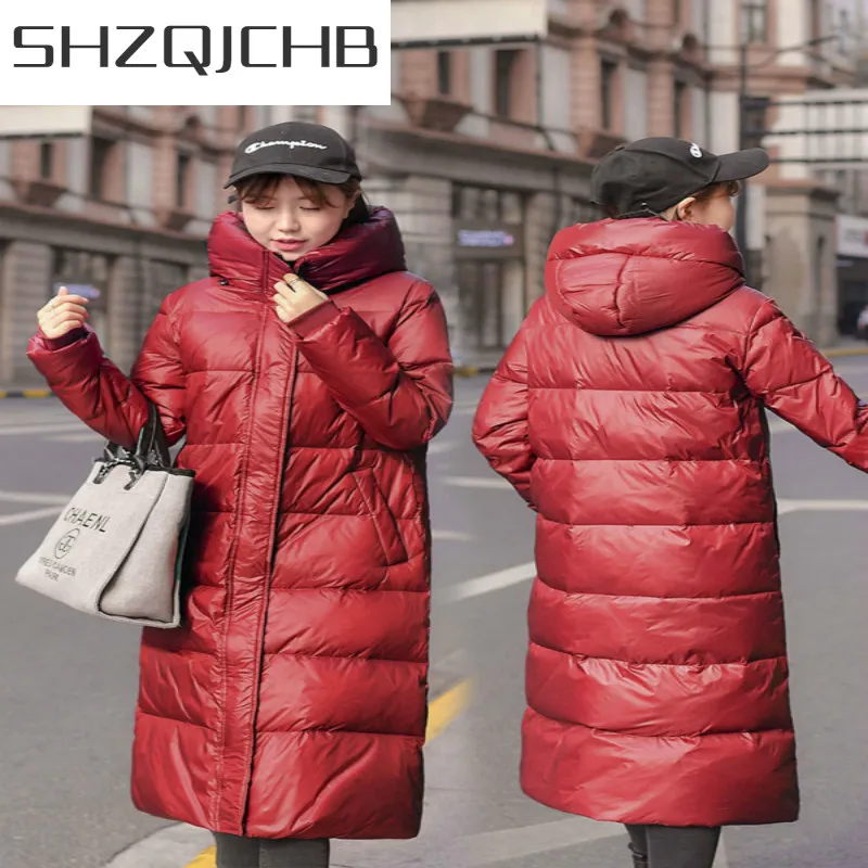 

SHZQ зимние женские пальто 2021 Модный женский пуховик светильник кие куртки на утином пуху с капюшоном толстое теплое длинное пальто для зимы ...