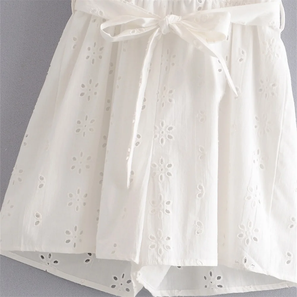 

2020 summer women's new fashion white V-neck short-sleeved hollow embroidery with belt bow decoration jumpsuit