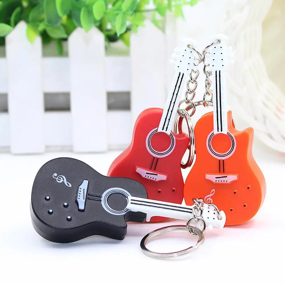 

Гитара, забавная гитара светодиодный светильник кой, звукоизлучающий брелок, маленькая подвесная игрушка, брелок-держатель, подвесное укра...