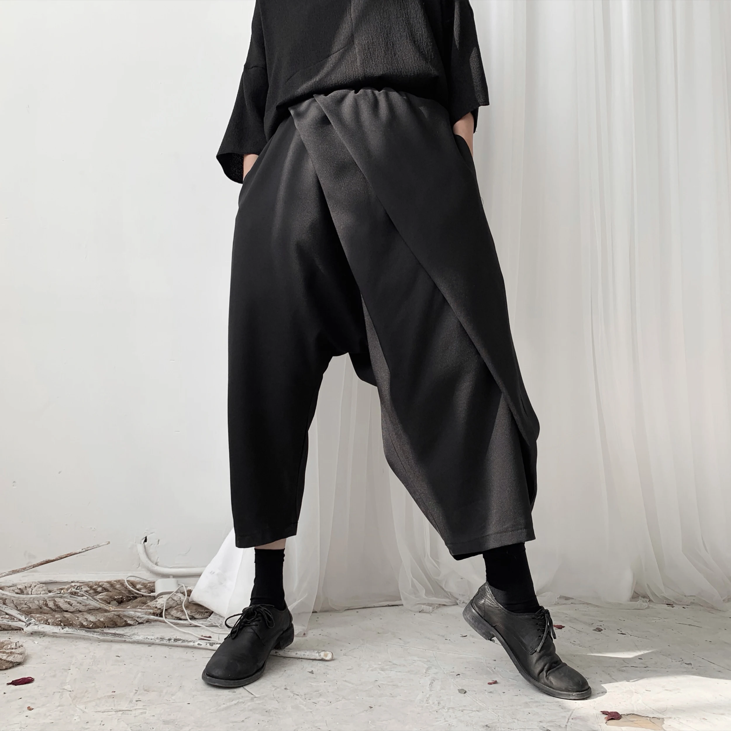 Dark Yamamoto Haute couture with irregular pleated Harem pants and slacks