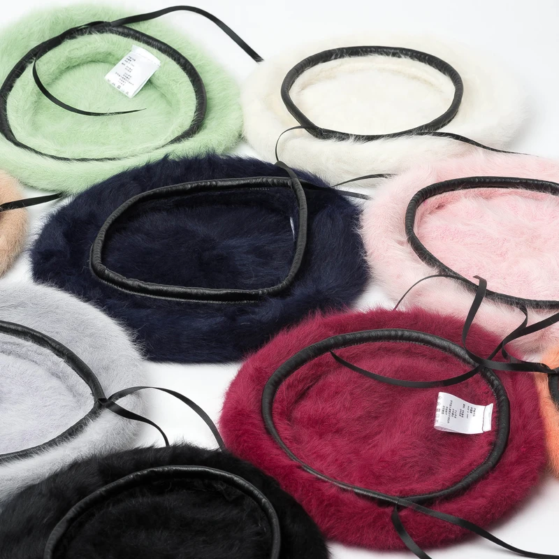 

Новинка, модная зимняя женская шапка-берет из кроличьего меха, элегантная женская однотонная шапка, плотные теплые наушники, Вязаная Шерстя...