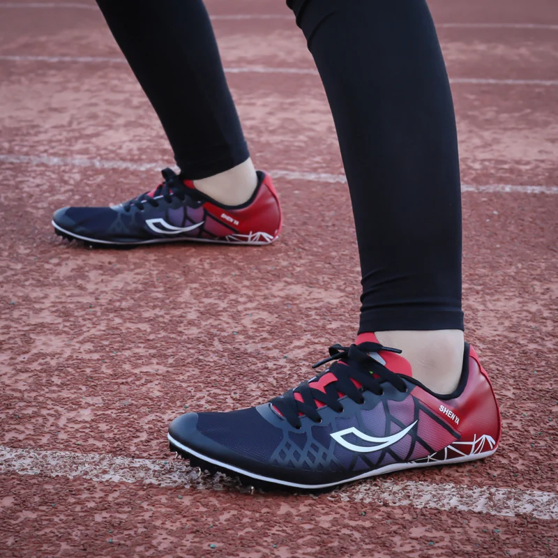 

Men Women Boys Girls Track and Field Shoes Professional Spikes Running Jumping Shoes Breathable Racing Sprint Sneakers Men