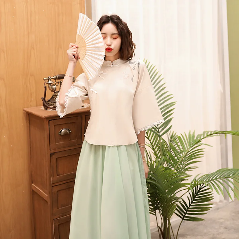 

Oriental clothing Girls 2020 summer chinese cotton and linen printed shirt solid color chiffon skirt suit