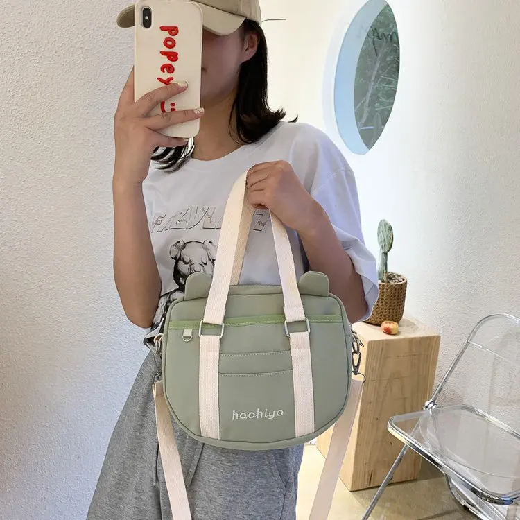 

New jk uniform bag cartoon bag wild single shoulder bag College Students messenger bag Simple solid colorportable small fresh