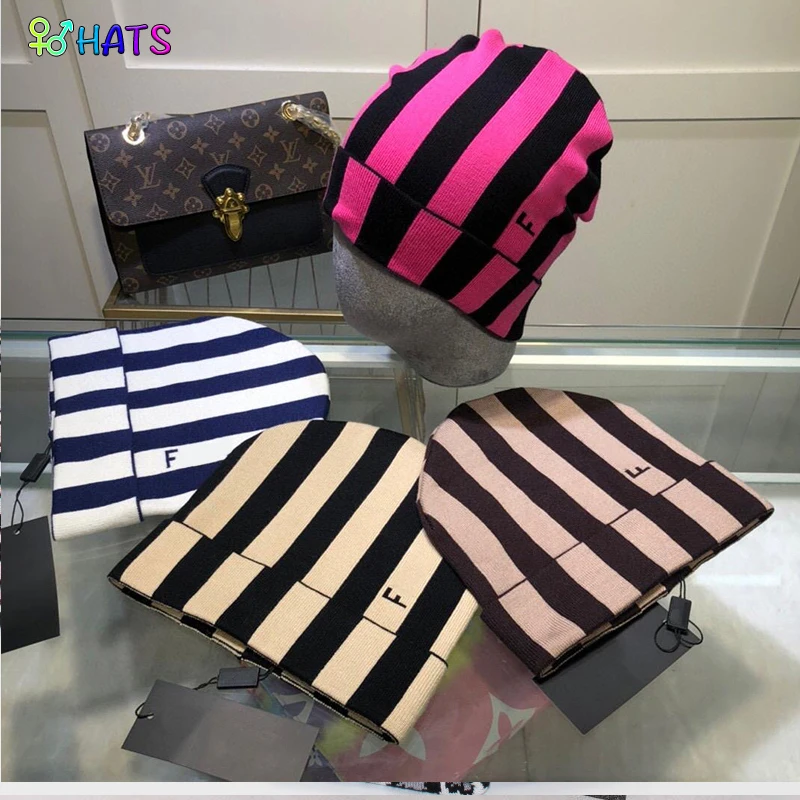 

2021 autumn and winter new female solid color striped beanie hat men's outdoor ski woolen hat riding warm knitted hat