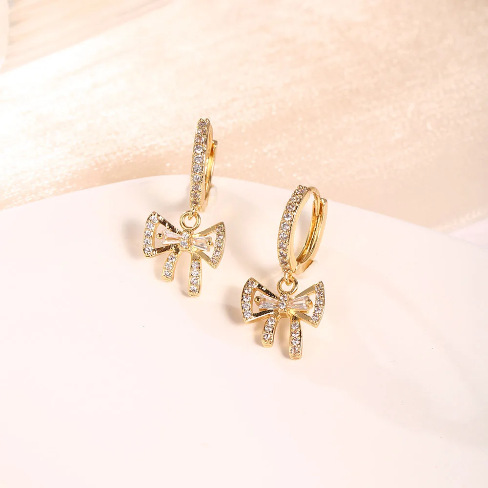 

Женские металлические серьги с бантом и бриллиантами, новый дизайн, модные трендовые рождественские популярные украшения для девочек, креа...