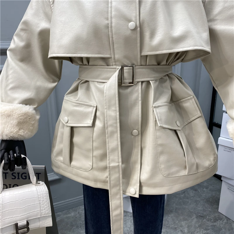 Цена 2021 Зимний новый стиль меховой отворот свободный пояс тонкий средней длины рабочие PU кожаная куртка плюс бархат толстый Модный женский