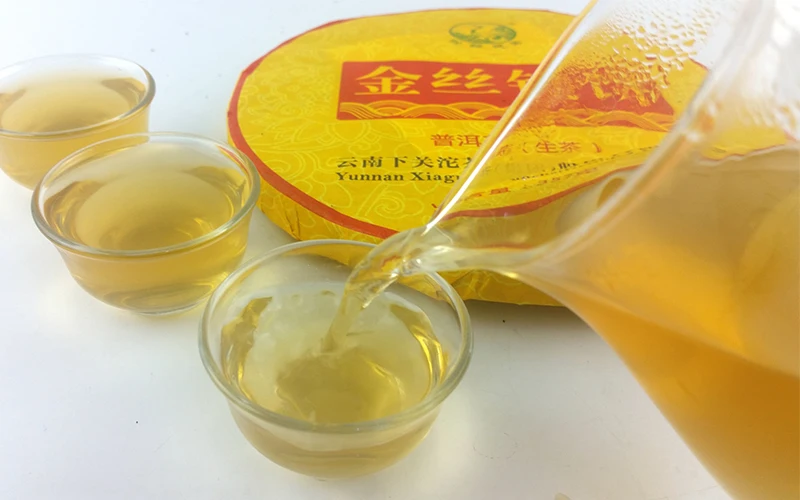 

2015 Xiaguan Golden Raw Pu-erh Jinsi Tiebing Shen Pu-erh 357g Organic Pu-erh Tea