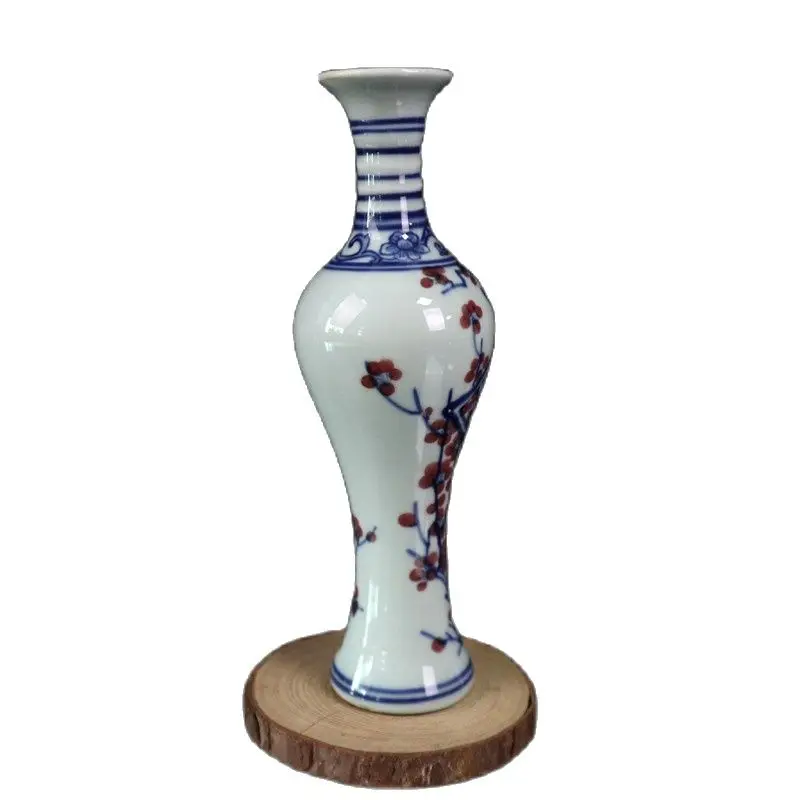 

Китайская старая фарфоровая сине-белая ваза с красной сливой