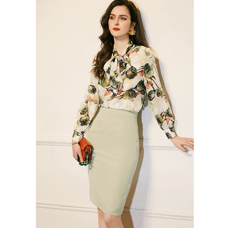 

2021 Spring High End Elegant Fashion Bow Tie Printed Chiffon Shirt Blouse Crop Top And Pure Color Skirt Suit 2 Piece Set