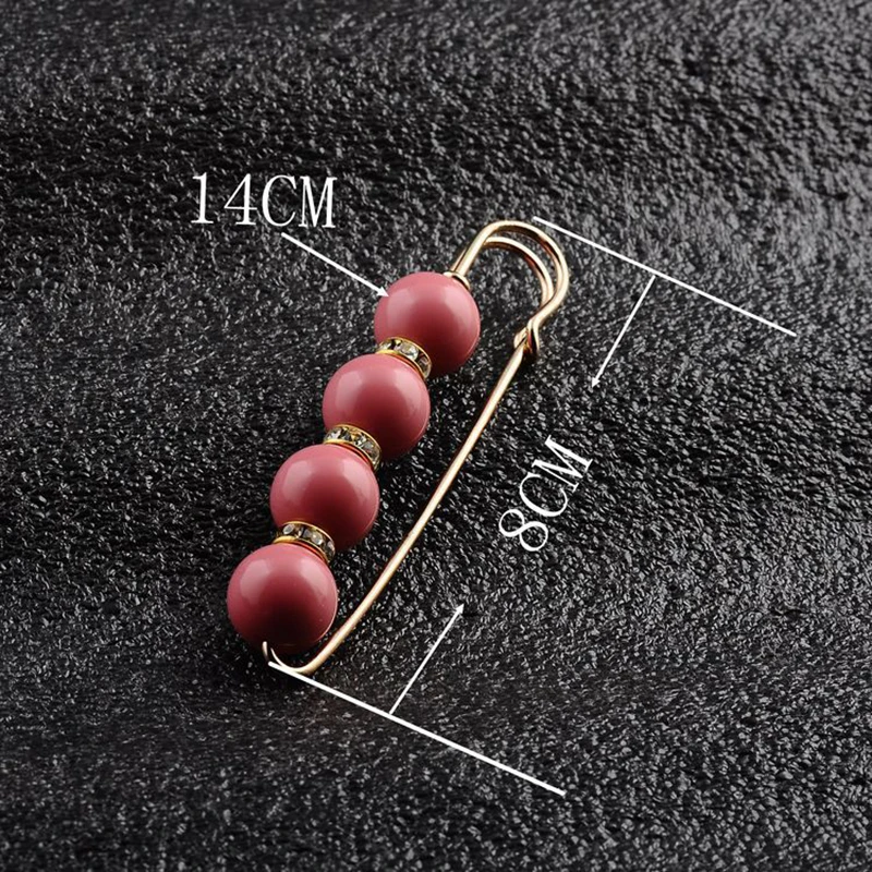 Большая брошь с искусственным жемчугом и кристаллом-бантом модная золотистая