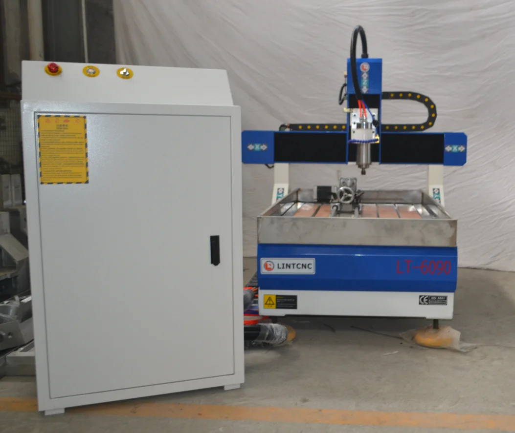 Маленький фрезерный станок с ЧПУ 6090 и вакуумным столом для МДФ алюминия
