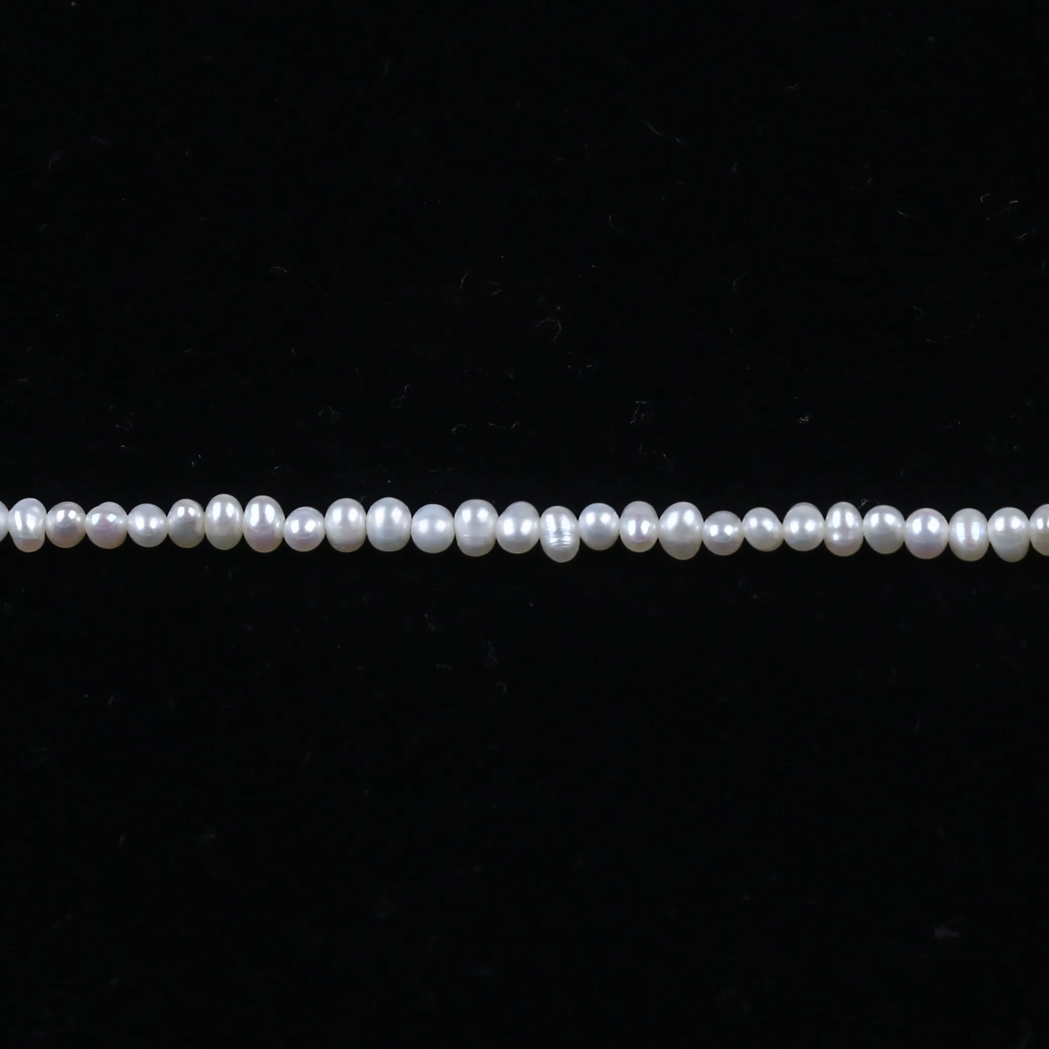 

wholesale 2-2.5mm AA Grade potato shape pearl strands