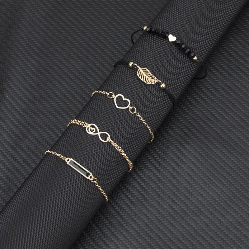 

Bohemia Charm Black Beads Bracelets For Woman Golden Link Hollow Love Leaf Long Stone Cuff Chain Fashion Bracelet Female Jewelry