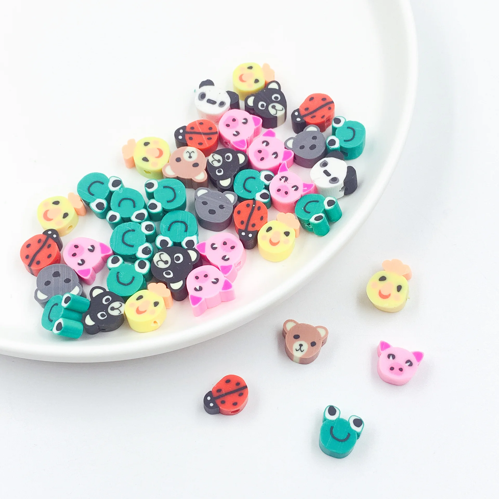 

Hobbyworker Mixed Cartoon Animal Clay Beads for Bracelet Necklace Jewelry Making DIY Accessories B0056