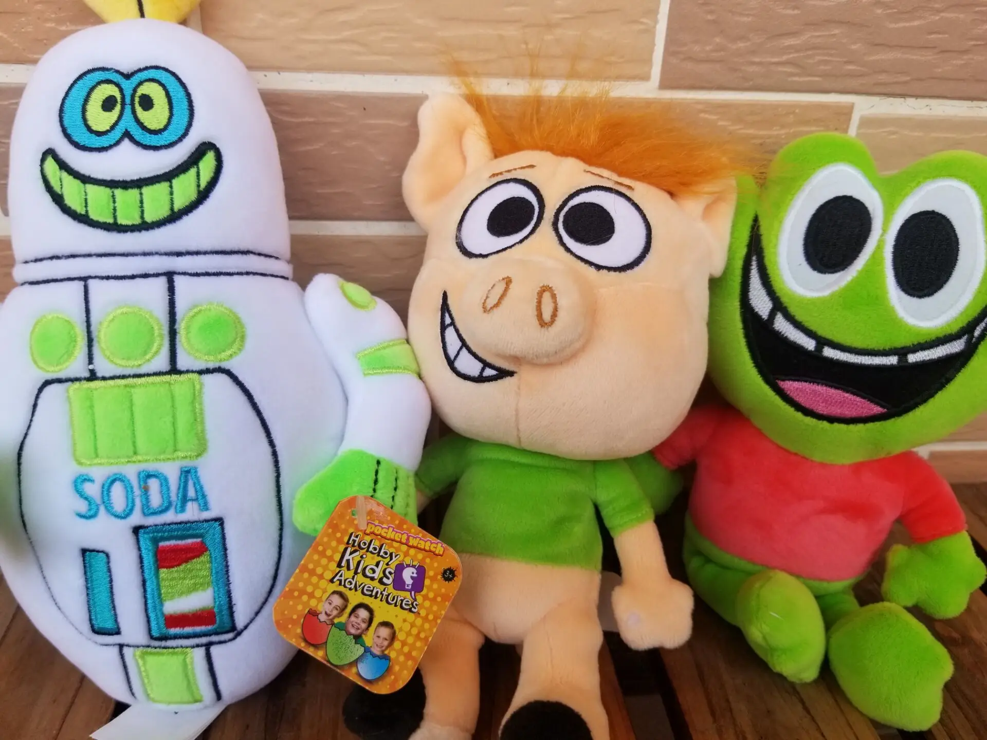 

Hobby Kids TV Hobby Kids Adventures Pocket Watch Hobby Pig Soda Bot Green frog 8” Soft Plush Toy Set of 3
