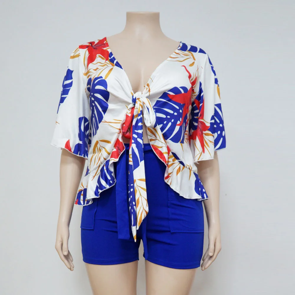 

Женская блузка с рукавом до локтя и цветочным принтом