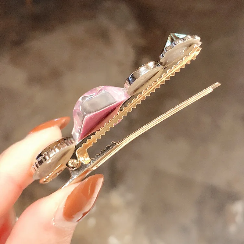 

The new hot ins bobby pins magic hair clip for women from Japan And Korea has side pinch top clamp mixed concise fringe decorate