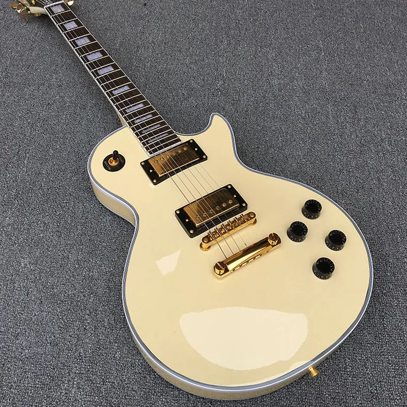 

Высококачественная 6-струнная Электрогитара, корпус акустической гитары с персиковым сердечником, Топ кремового цвета, золотая фурнитура, бесплатная доставка.