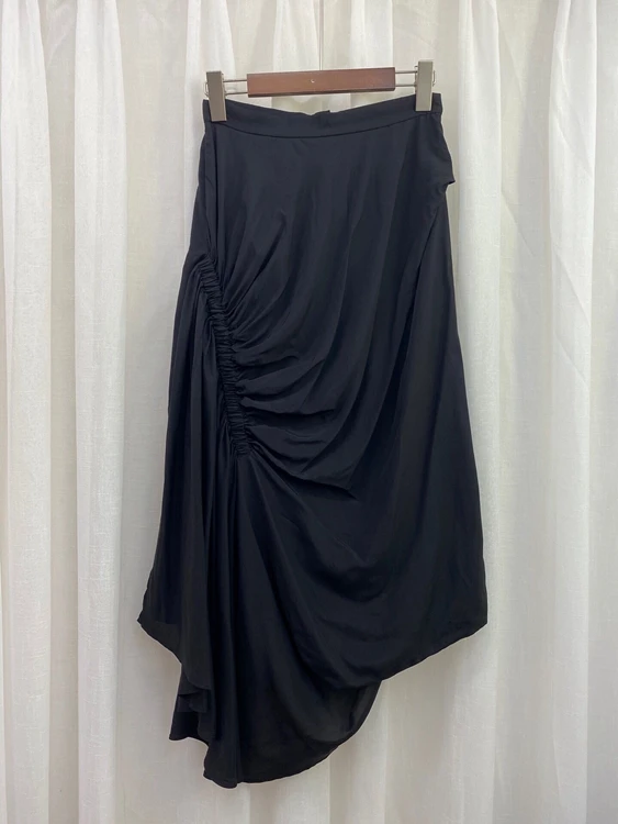 

2021 new women fashion solid color decorative side wrinkle twisted irregular all-match skirt 604