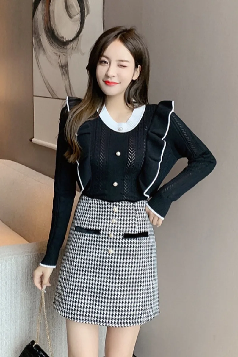 

Little fragrant temperament goddess fan suit fashion sweater sweater + a-line plaid skirt two-piece trend