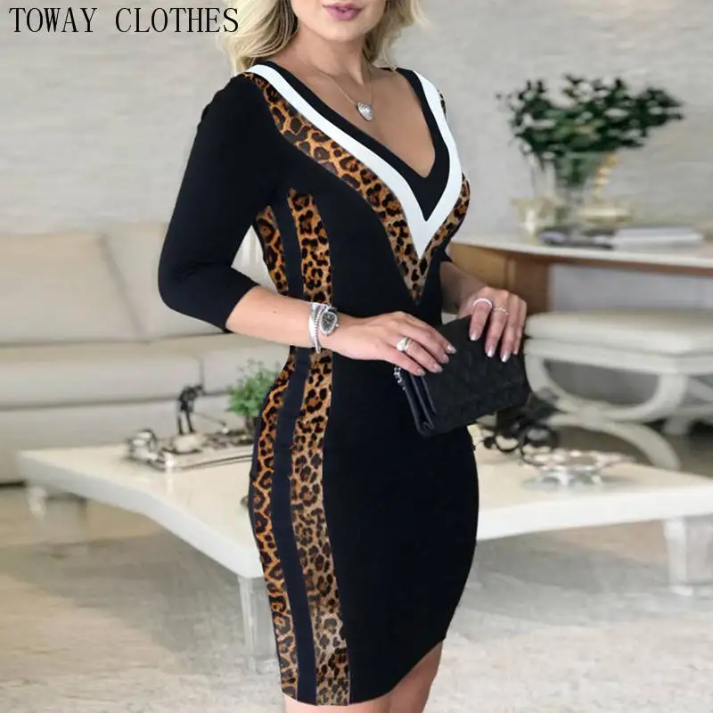 Женское платье в полоску с длинным рукавом облегающее цветными блоками и принтом