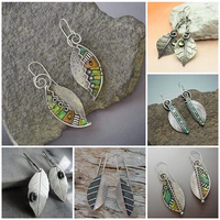 bohemian vintage green leaves dangle earrings for women ethnic jewelry zigzag metal spiral hollow earrings