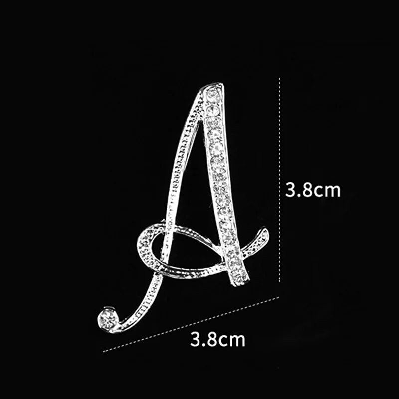 Брошь унисекс в виде английской искусственной буквы кристалл серебряного цвета