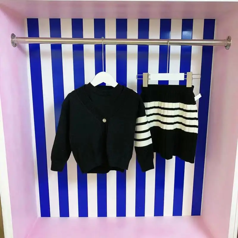 

Explosive children's clothing 2021 early autumn new products girls' knitted suit skirts affordable three-piece suit, jacket + ve