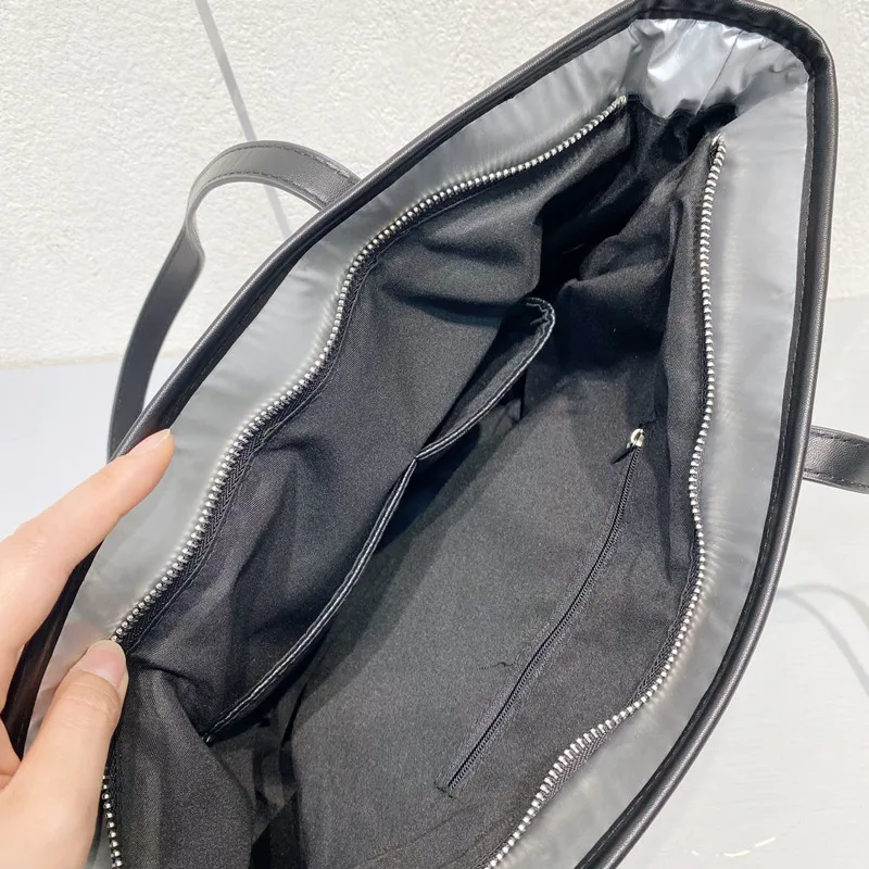 

Female bag new style for autumn and winter Winter Bag for Women Waterproof Nylon Bag Space Pad Cotton Feather Down Bag Large Bag