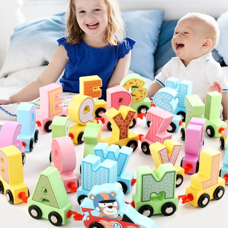 

Wooden Alphabet Train Building Blocks 26 English Puzzle Cognitive Magnetic Letters Car Toys Kids Early Education Toys