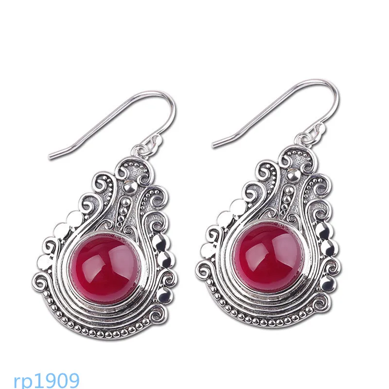 

KJJEAXCMY boutique jewelry S925 sterling silver jewelry women's red corundum blue sandstone earrings new