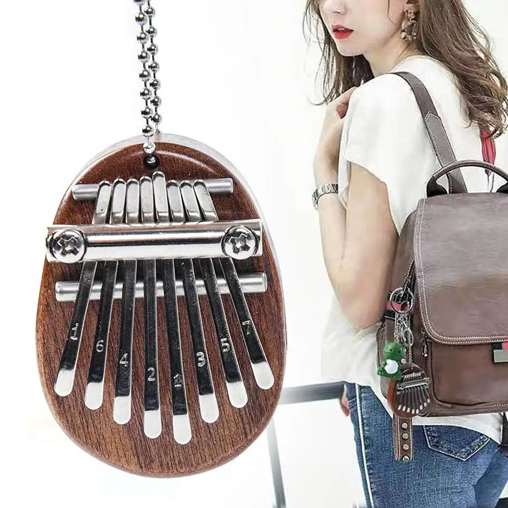 Новинка 2019 8 клавишное портативное мини пианино с большим пальцем рождественское