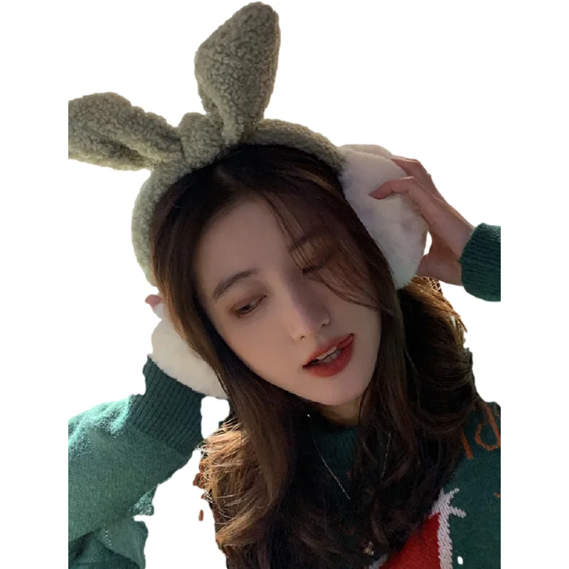 

Cartoon young girl heart bunny ears earmuffs