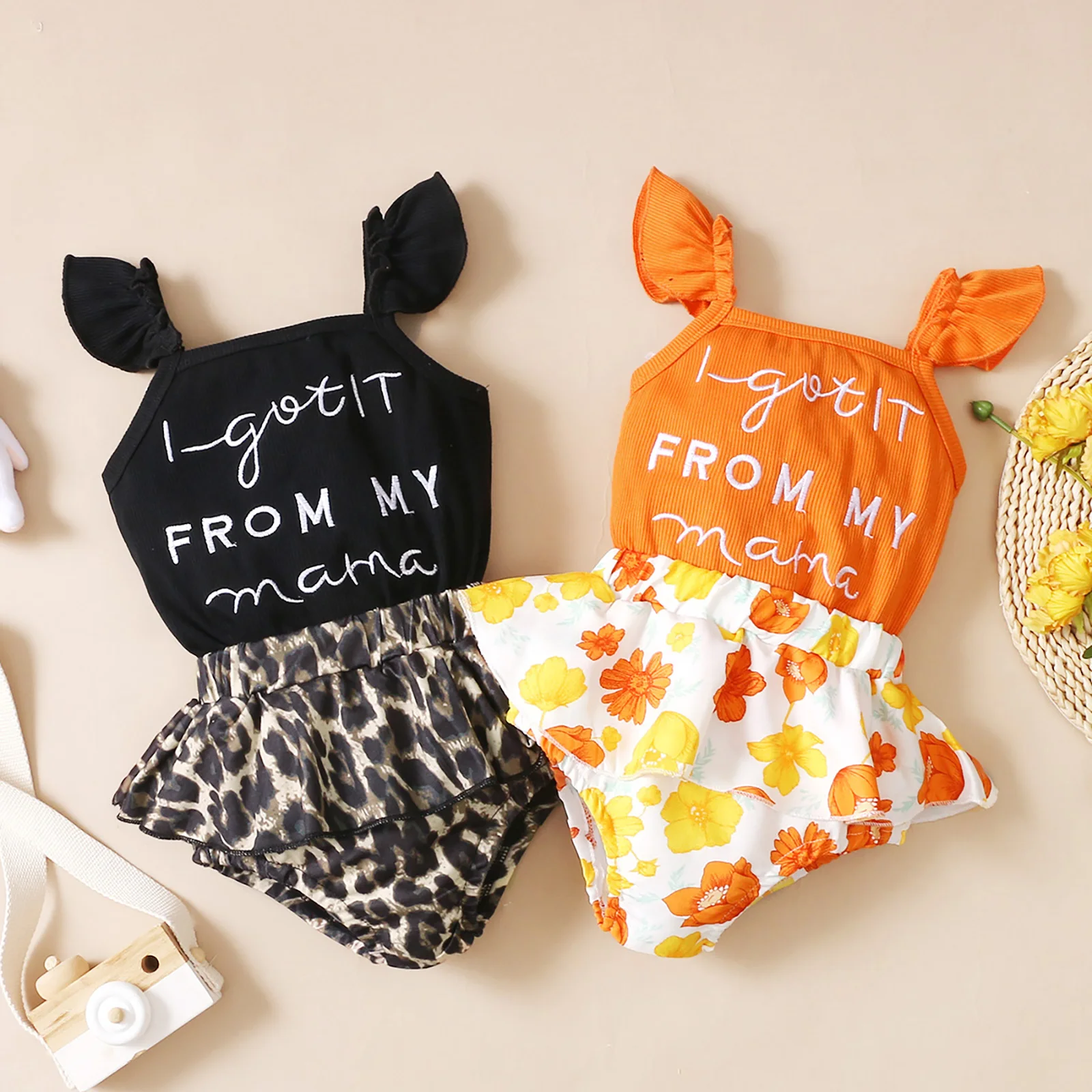 

2021-06-02 Lioraitiin 0-24M Newborn 2 Pcs Baby Girls Outfits Ribbed Letter Pattern Fly Sleeve Romper Flower Print Shorts