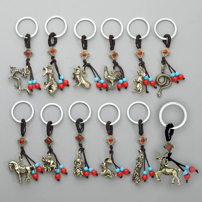 Металлический брелок в виде животных