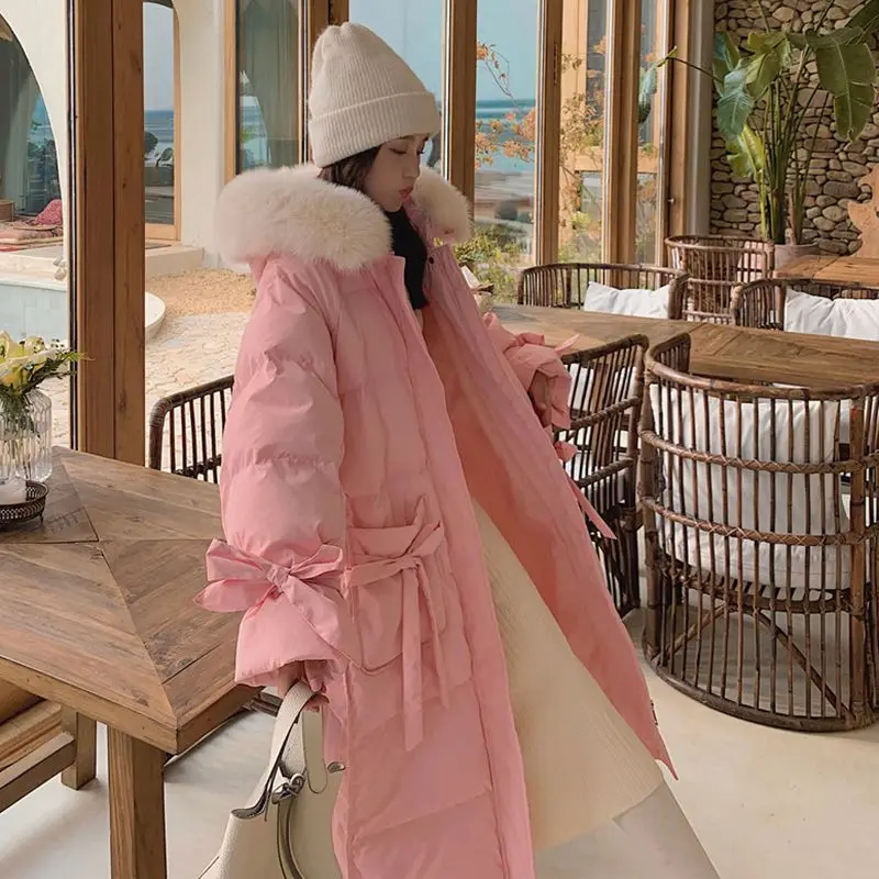 

Women Winter Jacket 2021 Thick Big Fur Collar Cotton Clothes New Korean Women Warm Cute Bow Loose Mid-length Over Knee Warm Coat