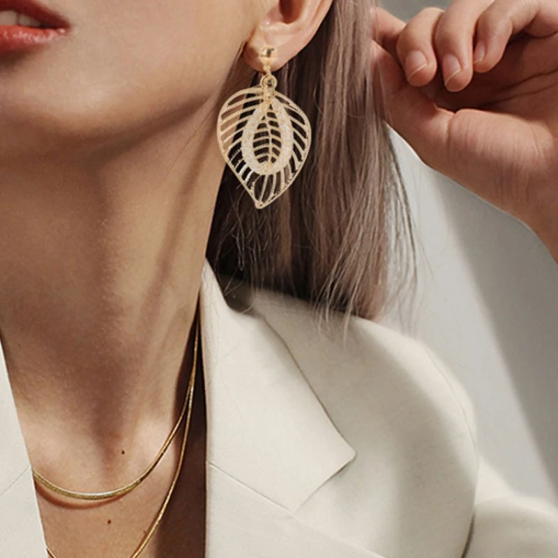 

Exaggeration Personality Geometry Hollow Out Metal Earrings Retro Leaf Ear Studs Fashion Trend Womans Earrings Jewelry