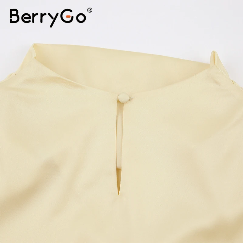 

BerryGo Casual long flare sleeve blouse women Spring highstreet loose keyhole back shirts Button collar femal tops streetwear