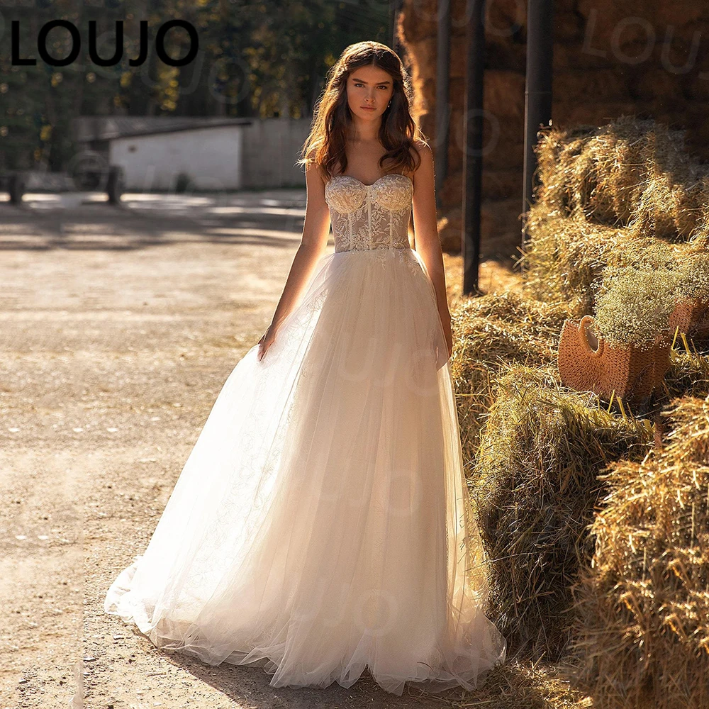 

LUOJO Ivory A-Line Tulle BOHO Wedding Dress Sweetheart Spaghetti Straps Appliques Lace Bridal Gowns Sexy Illusion Top Brides Dre