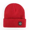 Solid Color Versatile Children's Autumn and Winter Cold Proof Outdoor Knitted  Boys  Girls  Smiling Face Hat 2