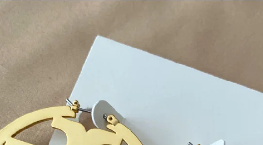 

Exaggerated Earrings letters hollowed out Logo Earrings women's exquisite polished smooth jewelry fashion commuter style