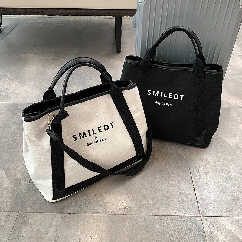 

2021 New High-capacity Women's Fashion Stiletto Bag Simple Canvas Shoulder Bag Tote Bag