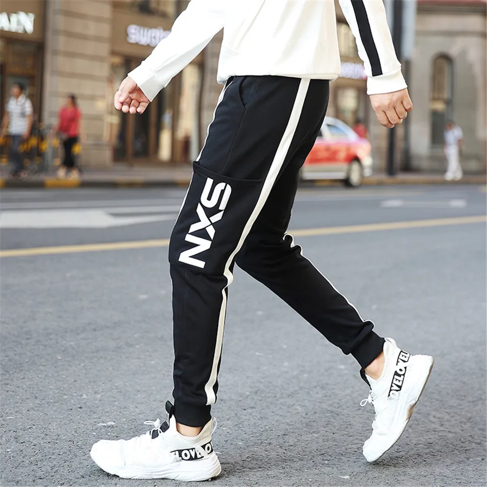 Мужские эластичные спортивные свободные брюки WWKK с боковыми карманами шаровары