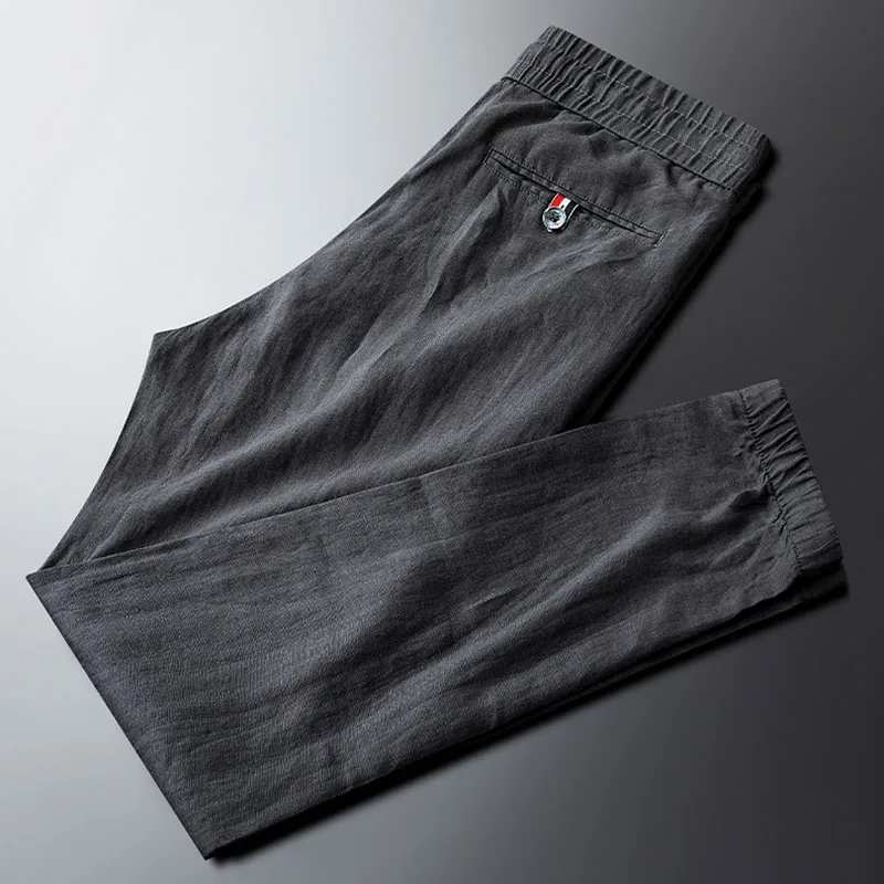 

Light luxury smoky gray high-end casual pants men's slim feet light and comfortable men's elastic waist trousers