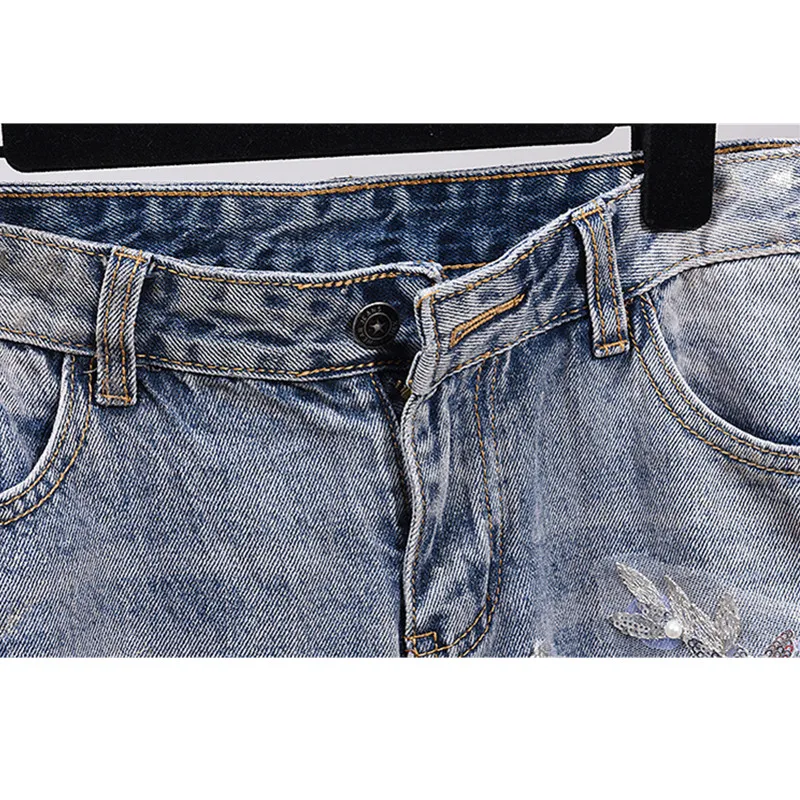 Женский джинсовый комплект куртка с бисером и вышивкой длинные штаны наряды из