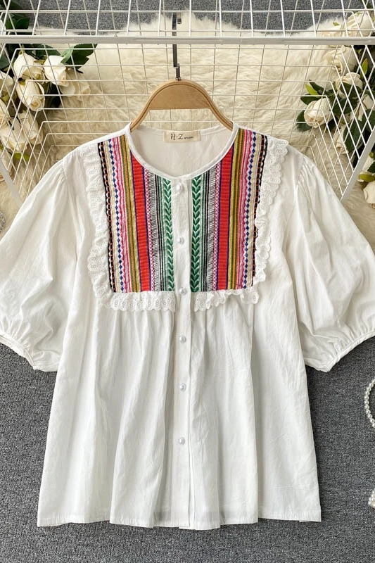 

South Korea Dongdaemun shirt female design sense niche retro embroidery wood ear loose baby shirt trendy all-match blouse
