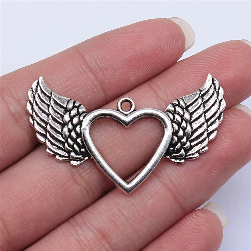 

Sejuani ожерелье подвеска 4 шт. 47x29 мм полые сердца крылья подвески